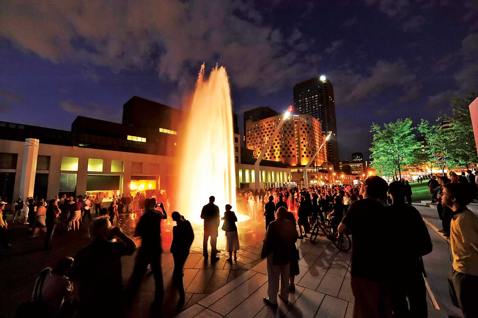 A light-filled water feature in Montreal at night