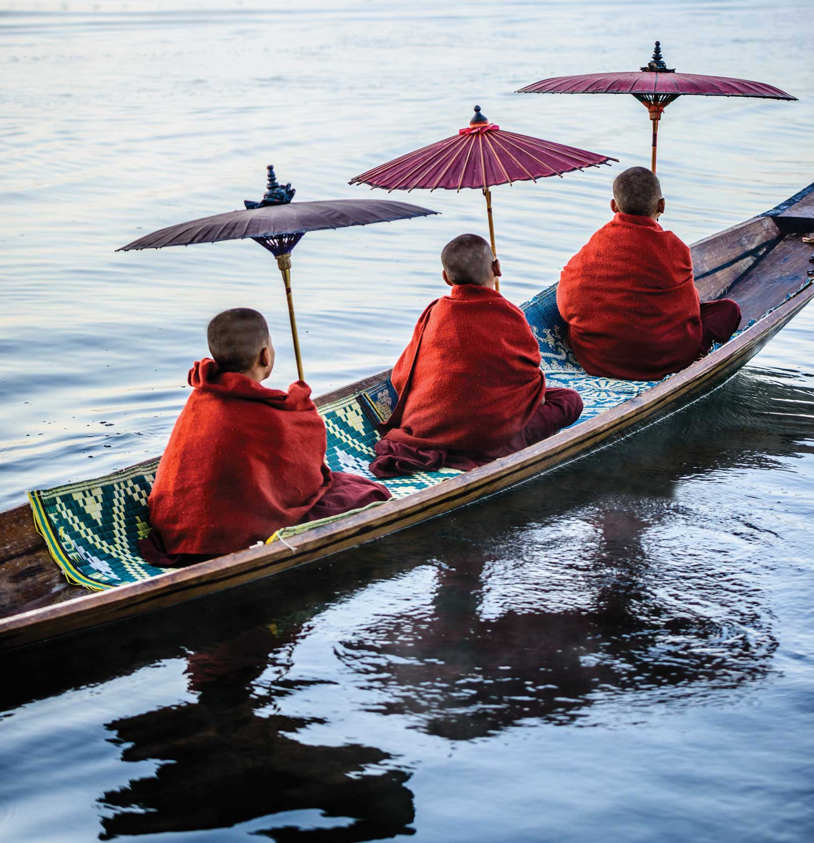 Myanmar boy monks on a boat