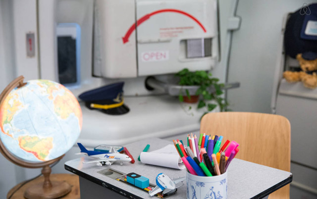 A child's work station on board the KLM and Airbnb apartment