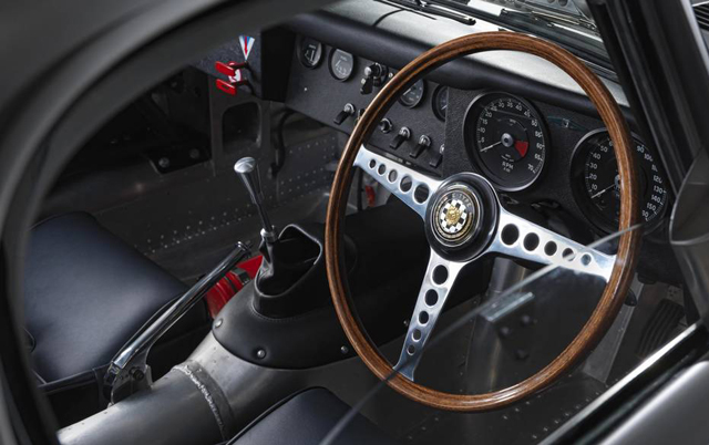 Original interior touches include hand-operated windows, a vintage wooden steering wheel and manual speed dials. Each of the six reproduced E-Types have sold to buyers for more than US $1 million a piece