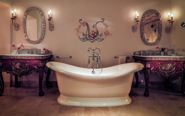 Each room has a sizeable, marble-clad bathroom with freestanding bath
