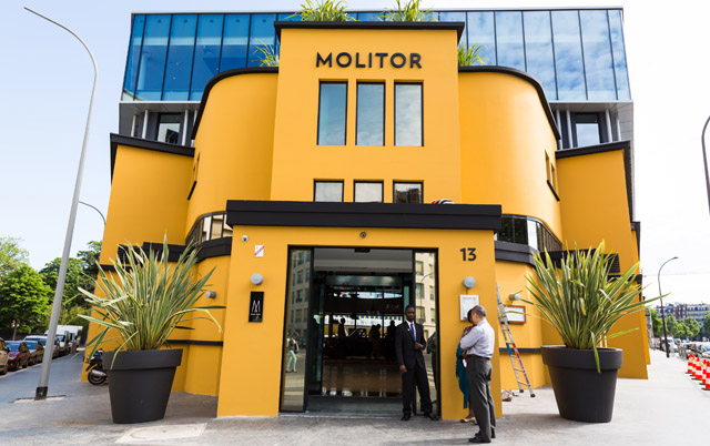 The entrance to Piscine Molitor maintains its Art Deco aesthetic